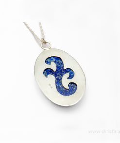 Image of a lapis lazuli oval stone pendant set in gold bezel on sterling silver back